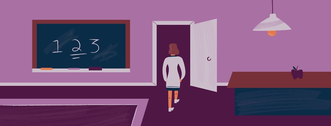 Woman walking out the door of her classroom