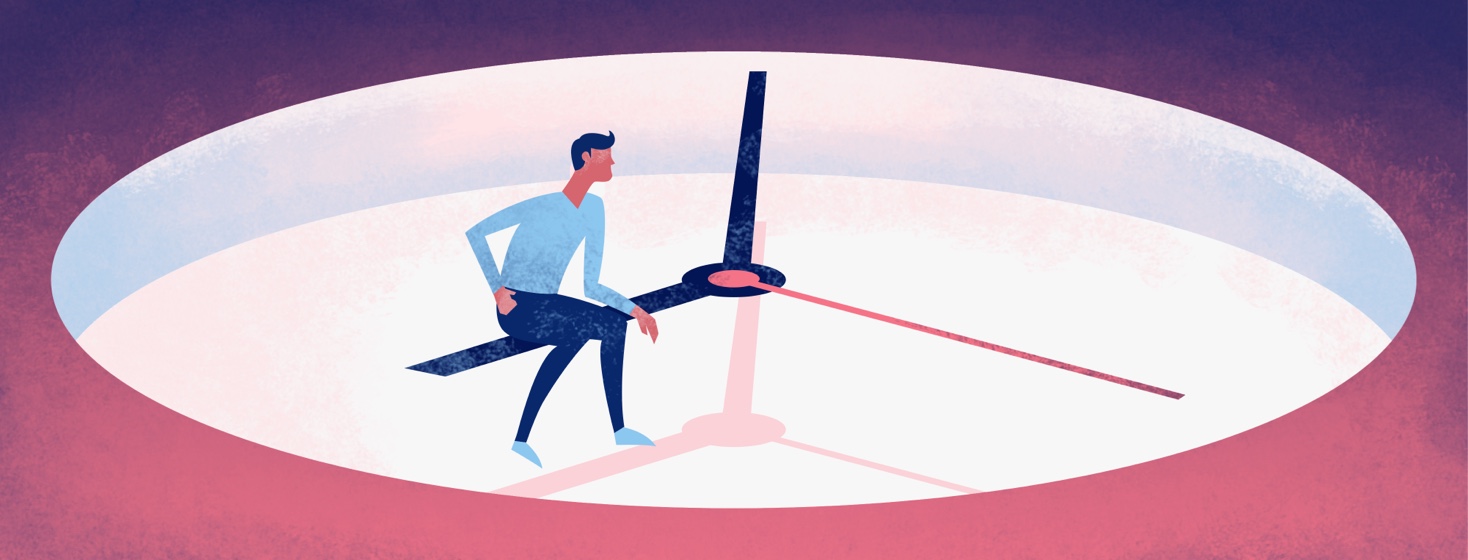 A man sitting on the hands of a clock