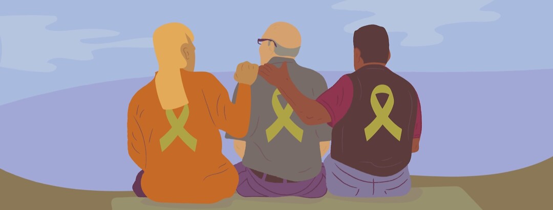 Two people with their arms around a third, all wearing cancer awareness ribbons