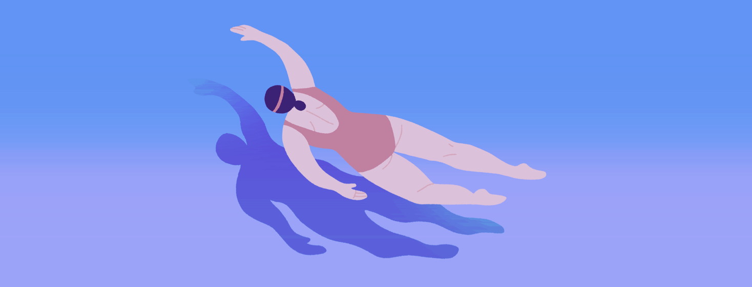 A woman swimming in tranquil water