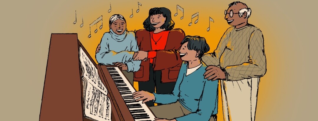 A family of adults and elderly people sit and stand around a piano, singing